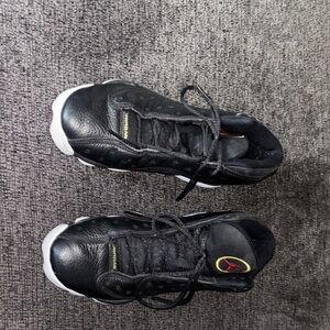 Jordan Black Leather Sneakers with Red Jumpman Accent